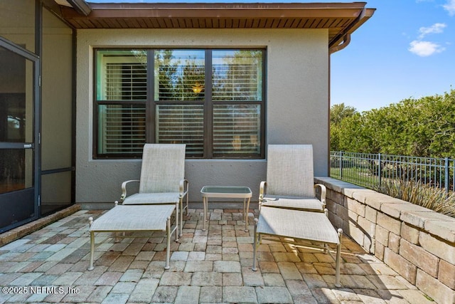 view of patio / terrace with fence