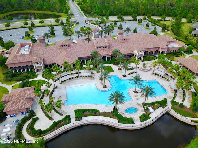 drone / aerial view with a water view