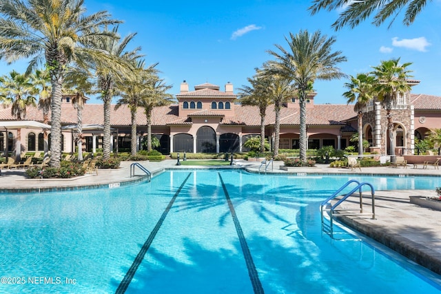 pool with a patio area