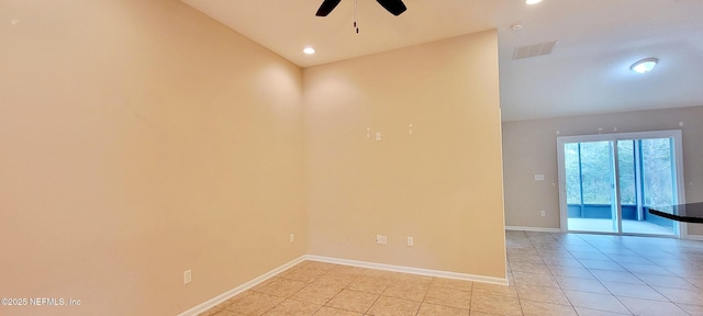 spare room featuring visible vents, a ceiling fan, recessed lighting, light tile patterned floors, and baseboards