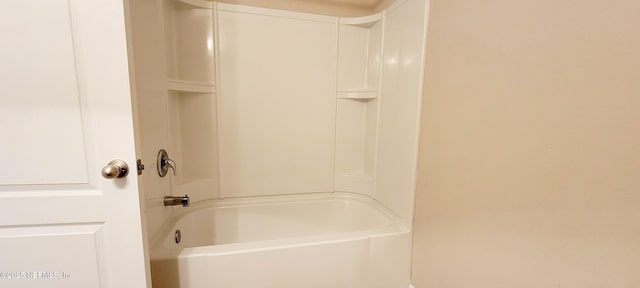 bathroom with shower / bath combination