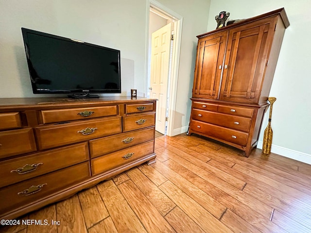 bedroom featuring light hardwood / wood-style floors