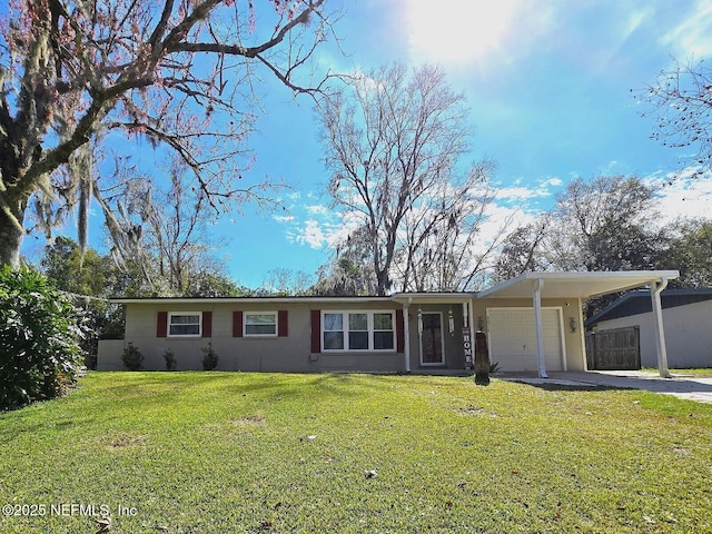 single story home featuring a front yard and a garage