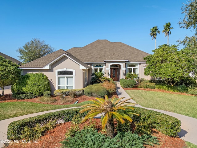 view of front facade featuring a front yard