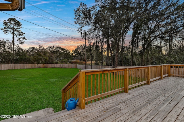994 Lakeridge Dr, Orange Park, FL 32065 - wooden terrace featuring a fenced backyard and a lawn