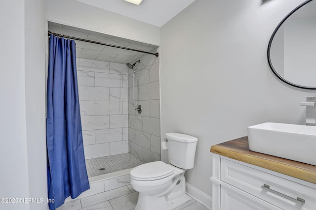 994 Lakeridge Dr, Orange Park, FL 32065 - bathroom with toilet, vanity, baseboards, marble finish floor, and a shower stall