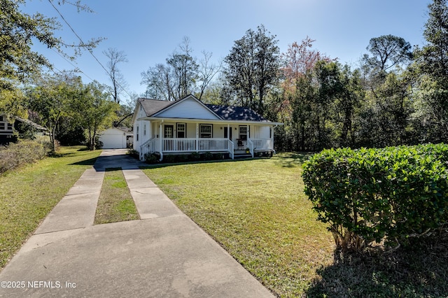 view of front facade with an outdoor structure, covered porch, and a front yard