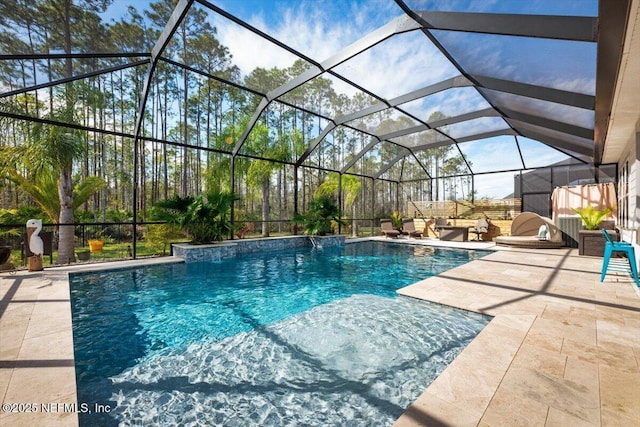 outdoor pool with a patio and glass enclosure