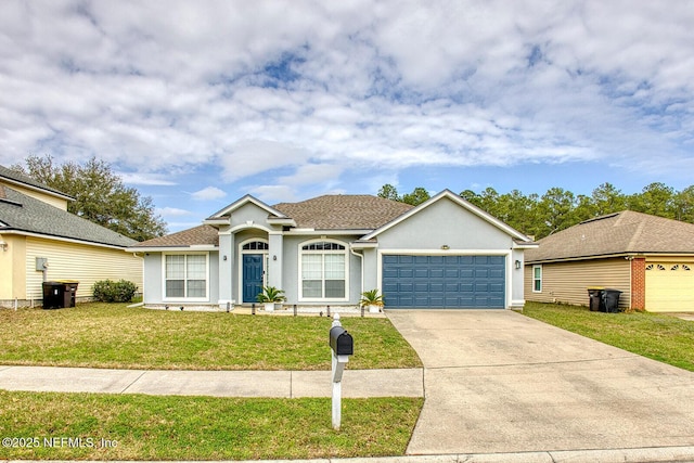 single story home featuring a front lawn and a garage