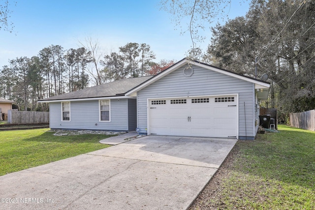 single story home featuring an attached garage, fence, and a front yard