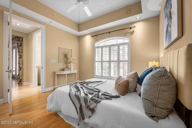 bedroom featuring recessed lighting, light wood-style flooring, and baseboards