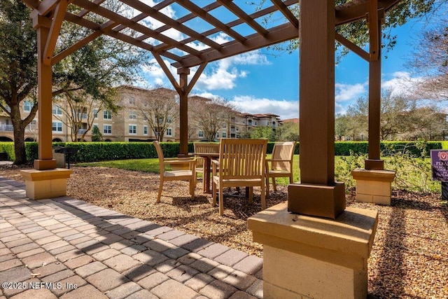 view of patio with a residential view and a pergola