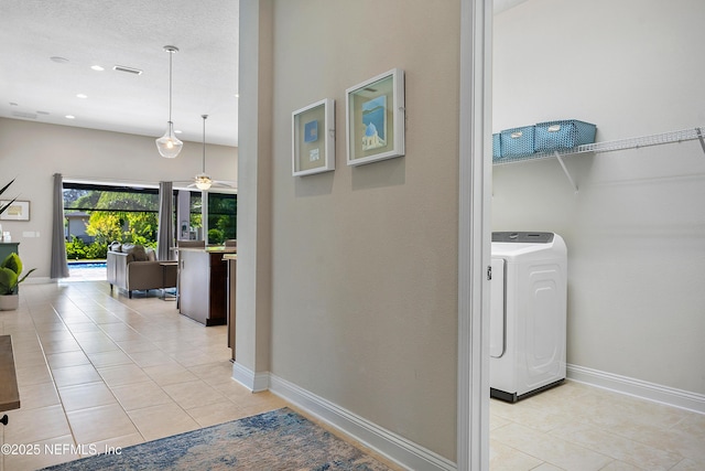 95384 Bermuda Dr, Fernandina Beach, FL 32034 - interior space with baseboards, washer / dryer, visible vents, and light tile patterned floors