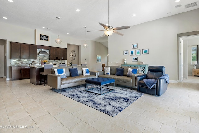 95384 Bermuda Dr, Fernandina Beach, FL 32034 - living area with recessed lighting, lofted ceiling, visible vents, light tile patterned floors, and ceiling fan
