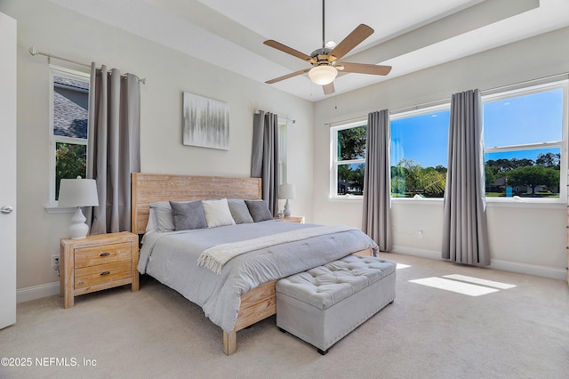 95384 Bermuda Dr, Fernandina Beach, FL 32034 - bedroom with baseboards, a ceiling fan, and light carpet