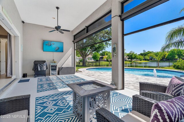 95384 Bermuda Dr, Fernandina Beach, FL 32034 - view of swimming pool featuring fence, a patio area, a fenced in pool, and a ceiling fan