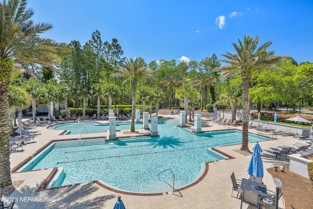 95384 Bermuda Dr, Fernandina Beach, FL 32034 - community pool featuring fence and a patio