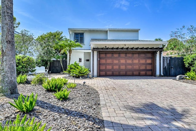 view of front of property with a garage