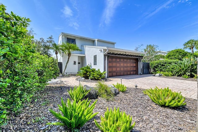 view of front of property featuring a garage