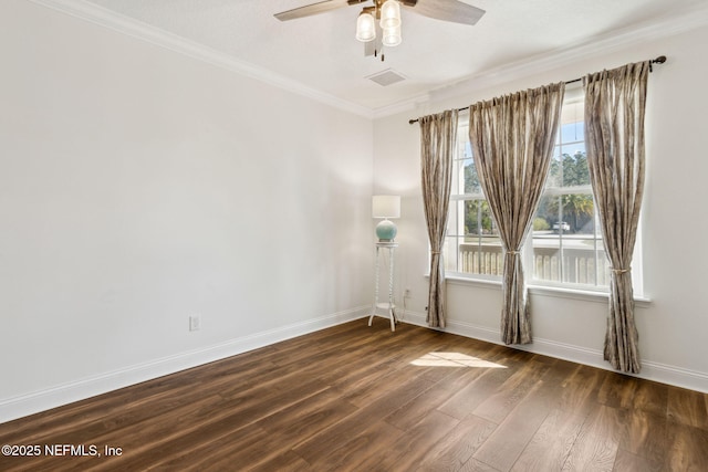 unfurnished room with ceiling fan, dark wood-style flooring, visible vents, baseboards, and ornamental molding