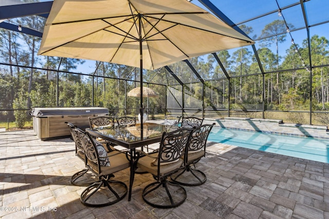 view of patio featuring glass enclosure, outdoor dining area, an outdoor pool, and a hot tub