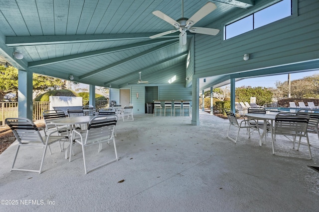 view of patio / terrace with outdoor dining space and a ceiling fan