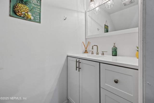 bathroom with visible vents and vanity