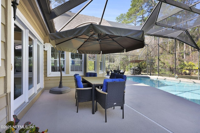 view of patio featuring glass enclosure and an outdoor pool