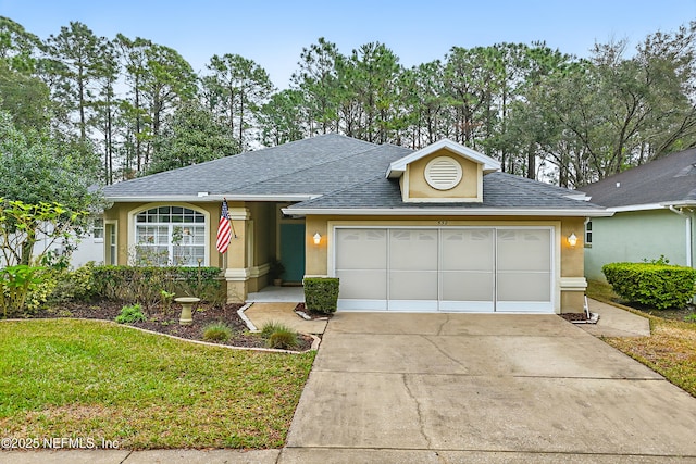 ranch-style house featuring concrete driveway, roof with shingles, an attached garage, and stucco siding