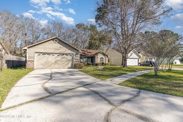 ranch-style house with brick siding, fence, a front yard, a garage, and driveway