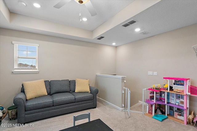 rec room featuring baseboards, recessed lighting, visible vents, and light colored carpet