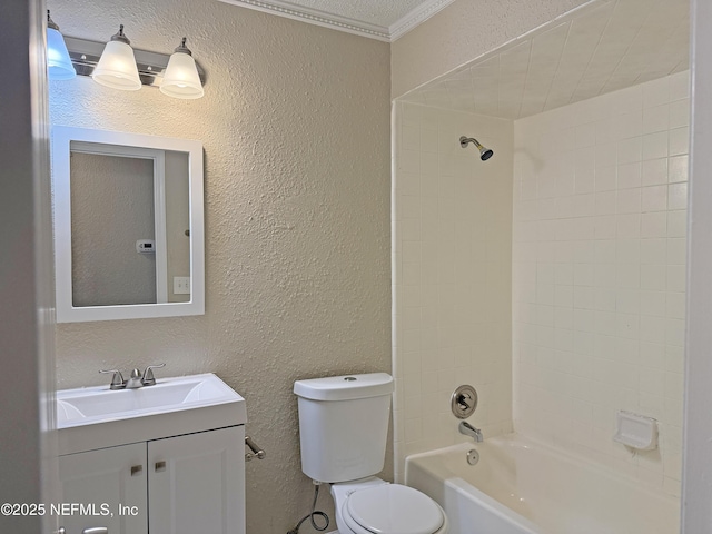 full bathroom featuring toilet, shower / bath combination, vanity, and a textured wall