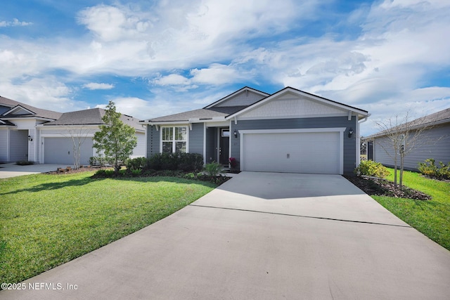 ranch-style home featuring a front yard, concrete driveway, and an attached garage