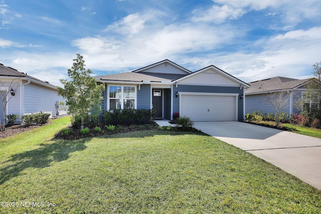 ranch-style house featuring a garage, a front yard, and driveway