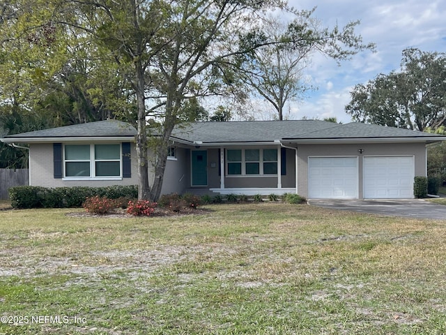 view of front of property with brick siding, concrete driveway, a garage, and a front yard