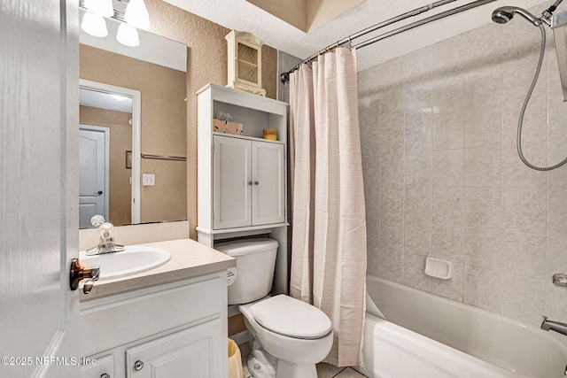 full bathroom featuring toilet, shower / bath combo, and vanity