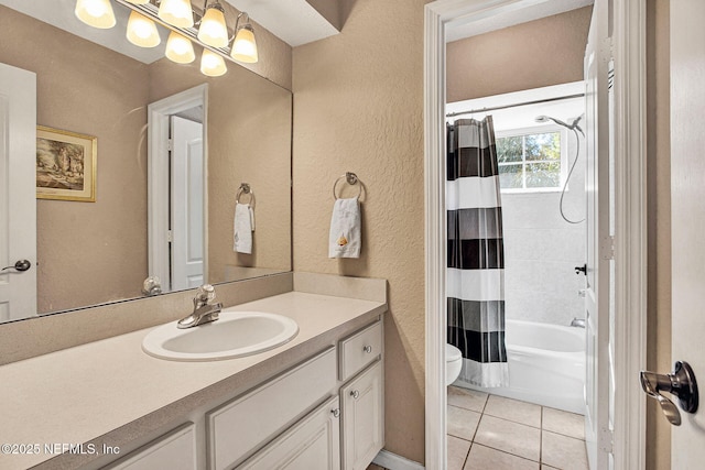 full bathroom featuring toilet, tile patterned floors, shower / tub combo with curtain, and vanity
