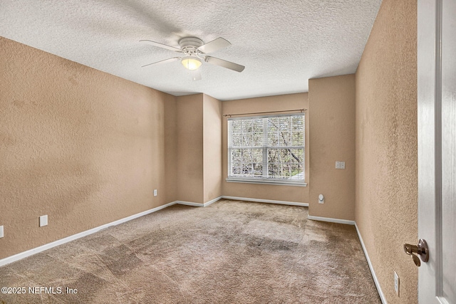 unfurnished room featuring carpet, a textured ceiling, and ceiling fan