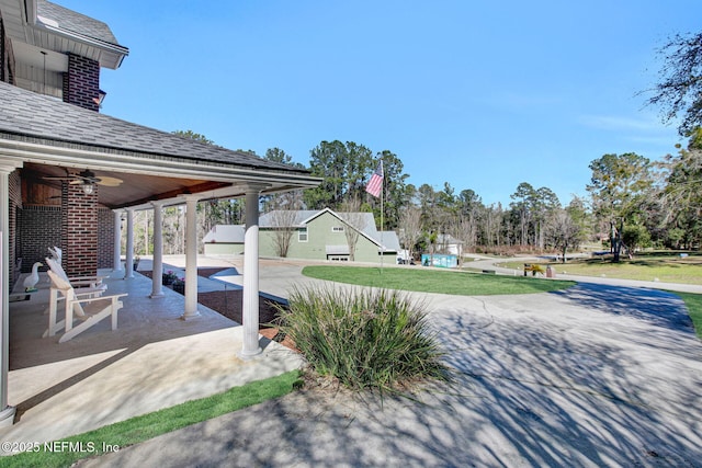 view of patio with ceiling fan