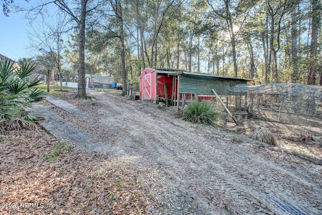 exterior space with an outbuilding
