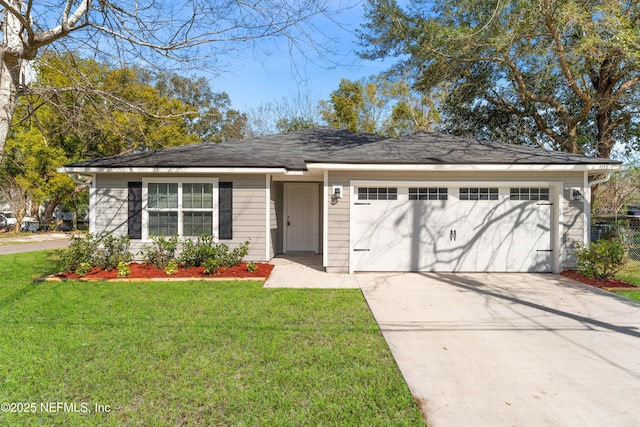 ranch-style home featuring a front yard and a garage