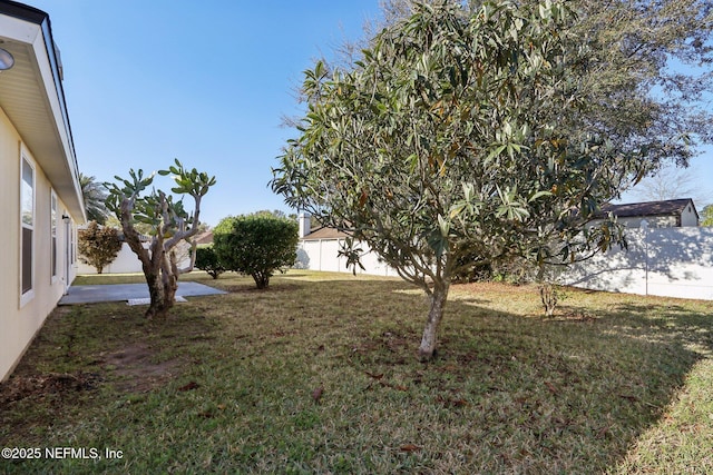 view of yard featuring fence