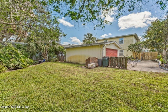 view of yard with a patio area and fence