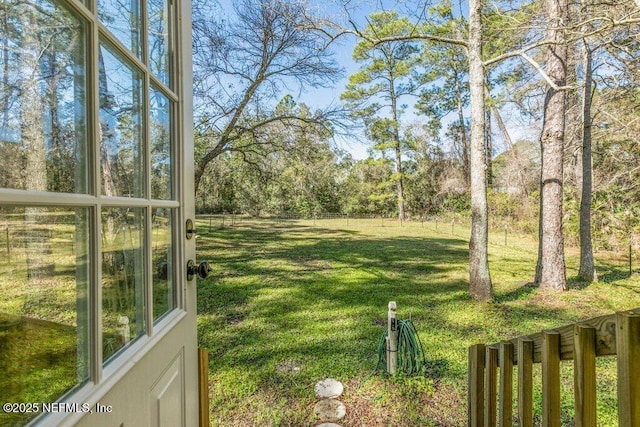 view of yard with fence