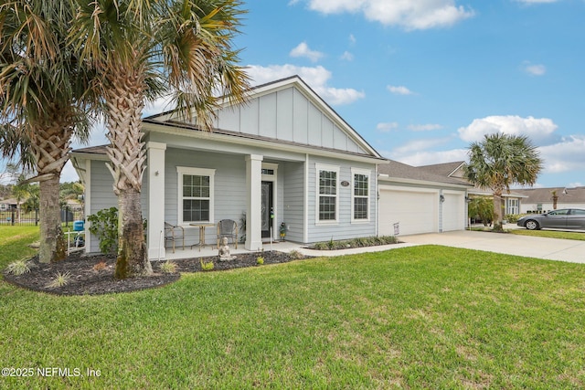 single story home featuring a garage, driveway, covered porch, a front lawn, and board and batten siding