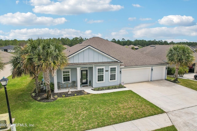 ranch-style house featuring a porch, concrete driveway, an attached garage, board and batten siding, and a front lawn