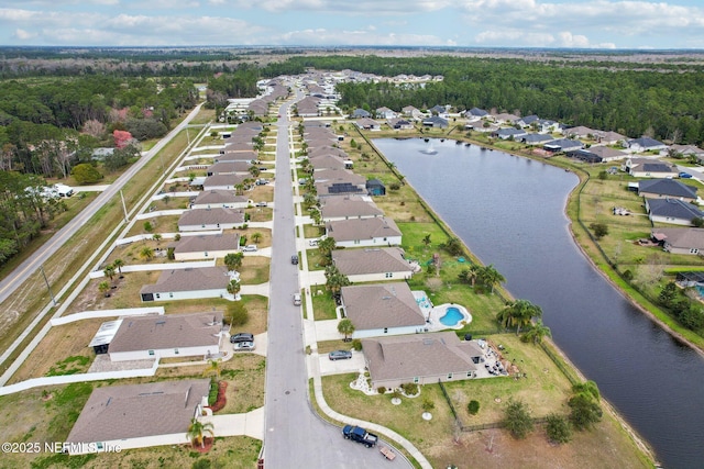 bird's eye view with a water view and a residential view