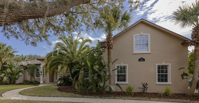 exterior space with stucco siding