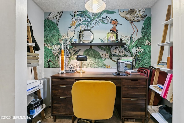 office space with a textured ceiling