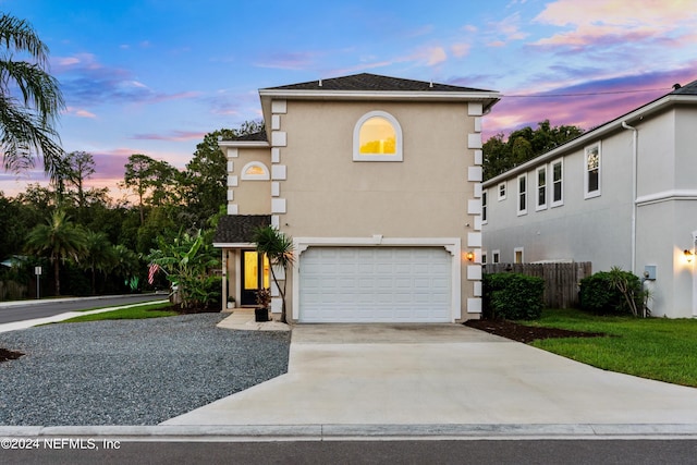 view of front of home with a garage